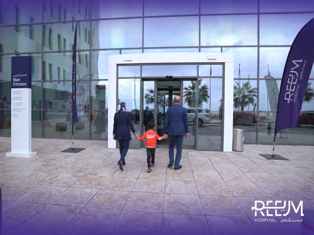 Family arriving at Reem Hospital reception